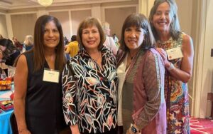 NCJW leaders (from left) Marcy Louza, Stacey Hader Epstein, Marcy Bass, and Susan Gordon posed as a group before the program.